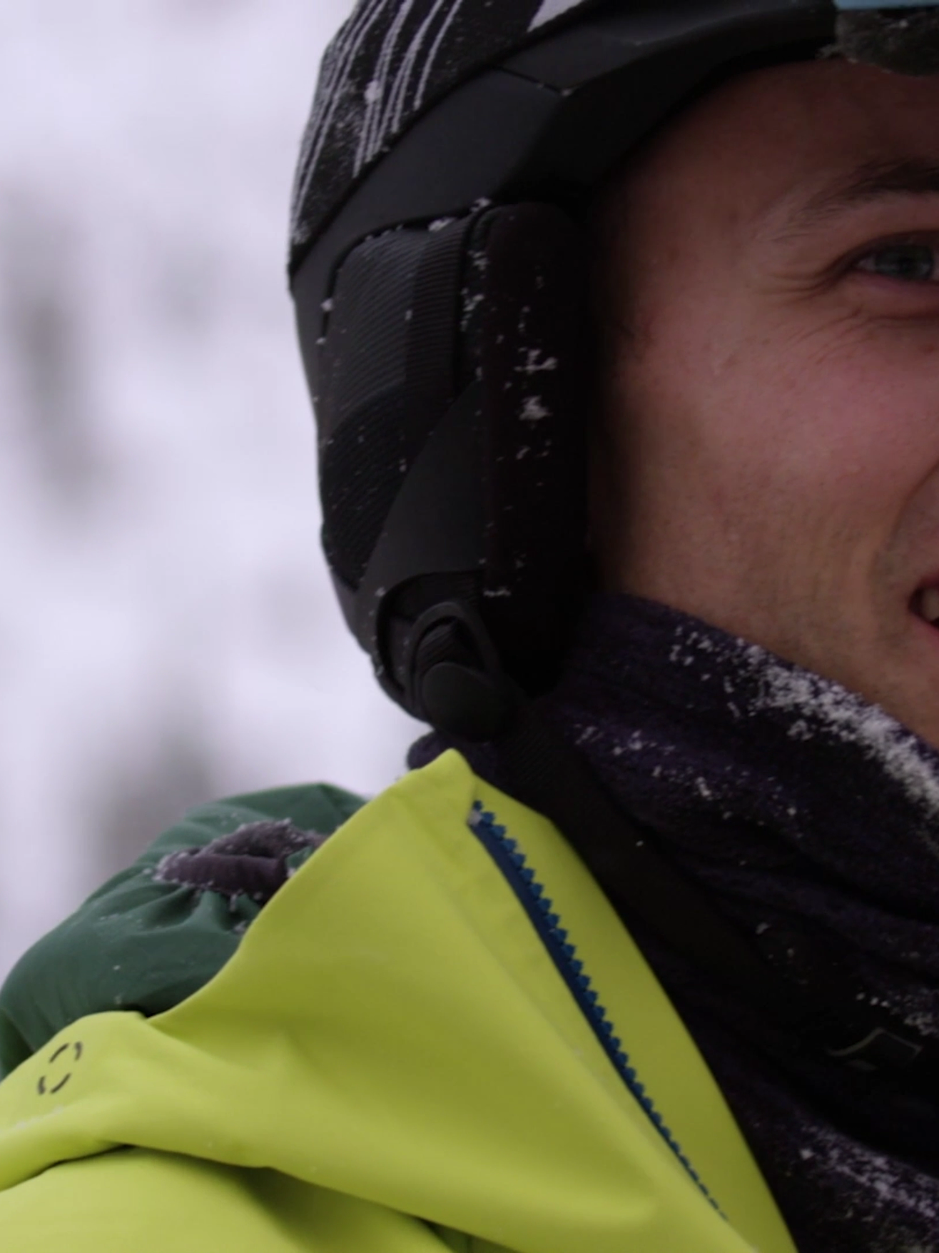 Kent smiling covered in snow