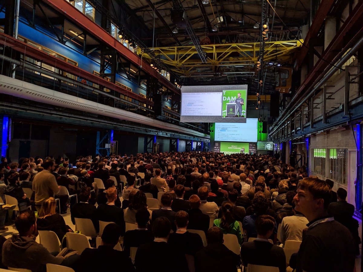 Kent presenting on stage in front of thousands of developers