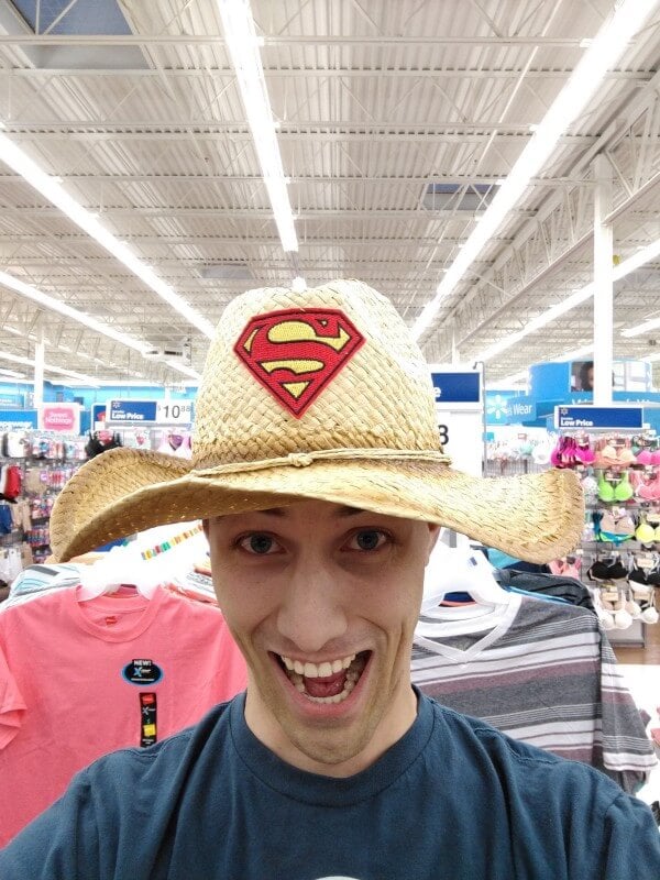 me wearing an awesome hat with a superman logo