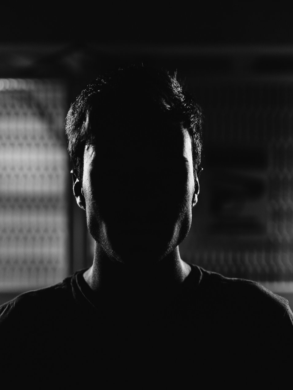 Man's face grayscale photo
