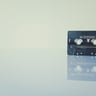 black cassette tape on white surface